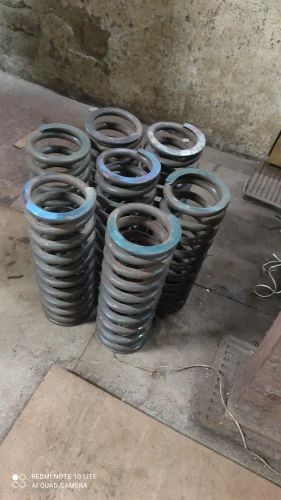 Helical compression spring